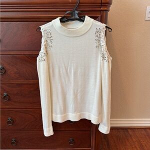 Venus off-white (ecru?) festive, cold shoulder sweater with embellishments.
